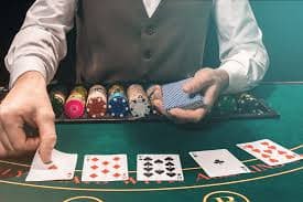 Filipino player browsing 77pinas jackpot games on a mobile phone